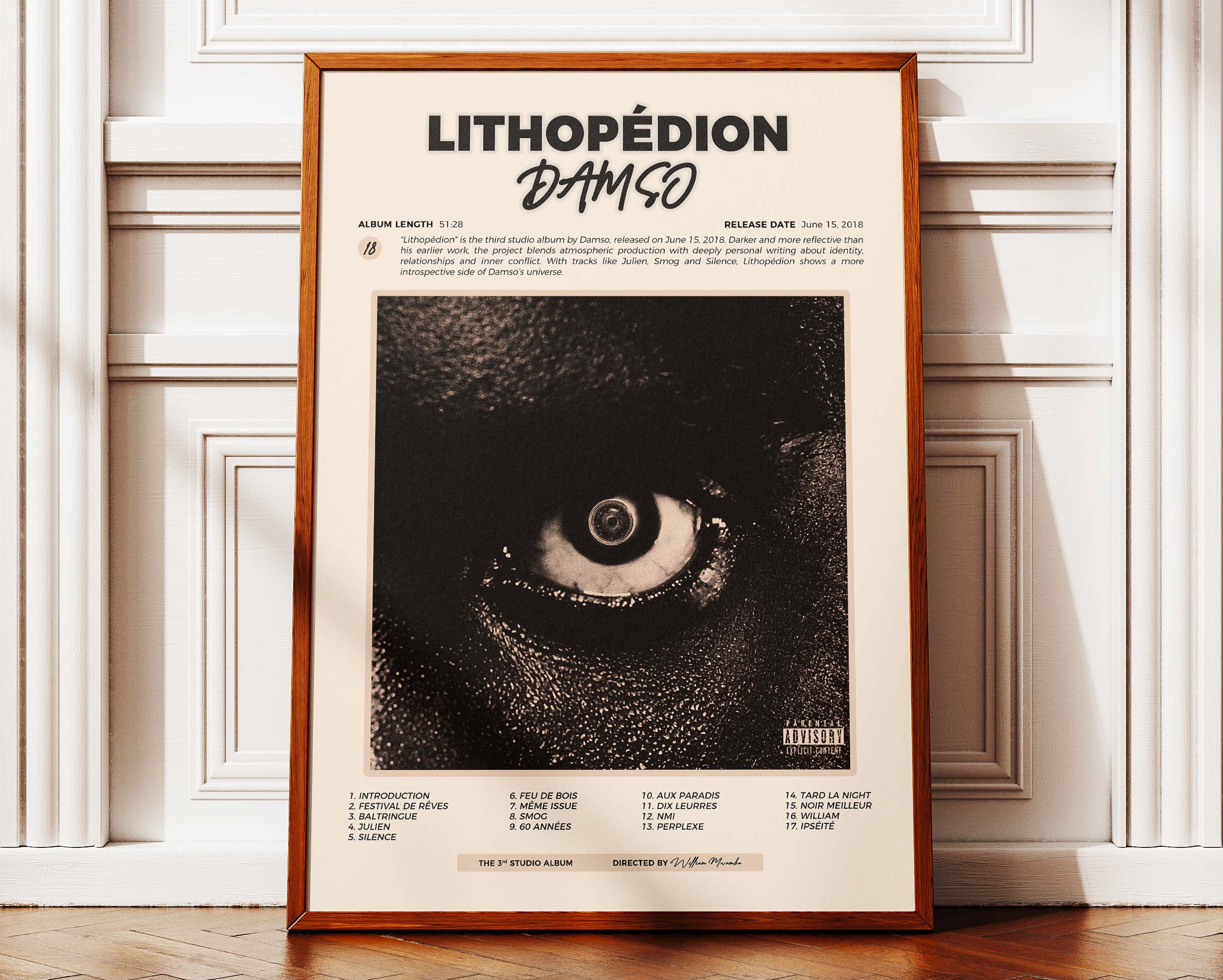 Poster minimaliste encadré de Damso Lithopedion posé contre un mur bien visible, décoration moderne et sombre.