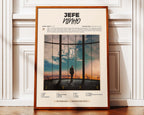 Poster minimaliste encadré de Ninho Jefe posé contre un mur bien visible, décoration rap luxe et moderne.