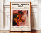 Poster minimaliste encadré de Zola Diamant du Bled posé contre un mur bien visible, décoration rap français moderne.