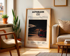 Poster minimaliste encadré de la mixtape Autobahn de SCH posé contre un mur dans un salon lumineux, art mural contemporain.