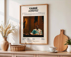 Poster minimaliste encadré de l'album Carré accroché au mur dans un salon lumineux et bien visible, design premium.